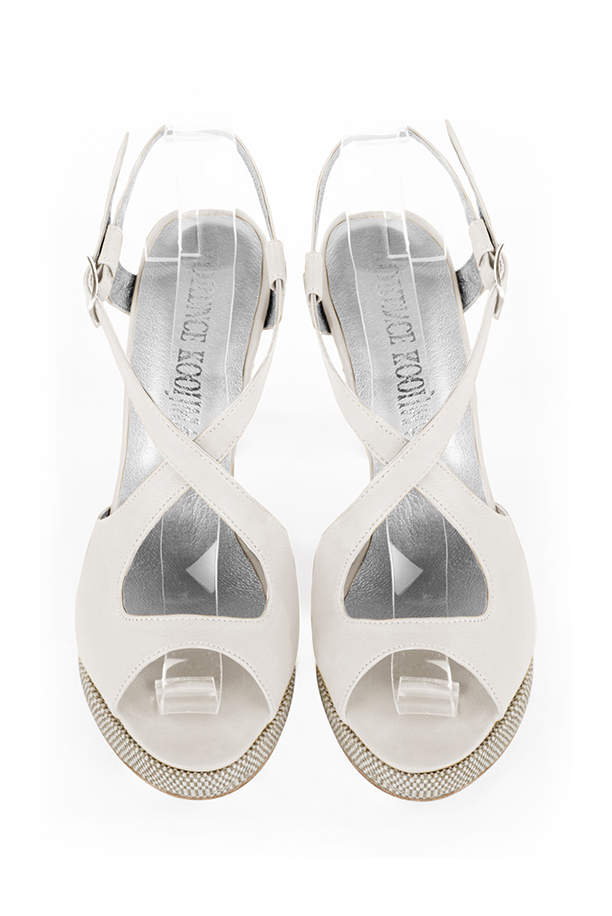 Pure white women's open back sandals, with crossed straps. Round toe. Very high slim heel with a platform at the front. Top view - Florence KOOIJMAN